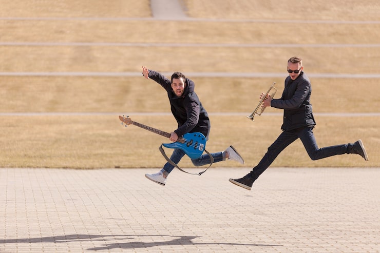 musicians-jumping_23-2147624386